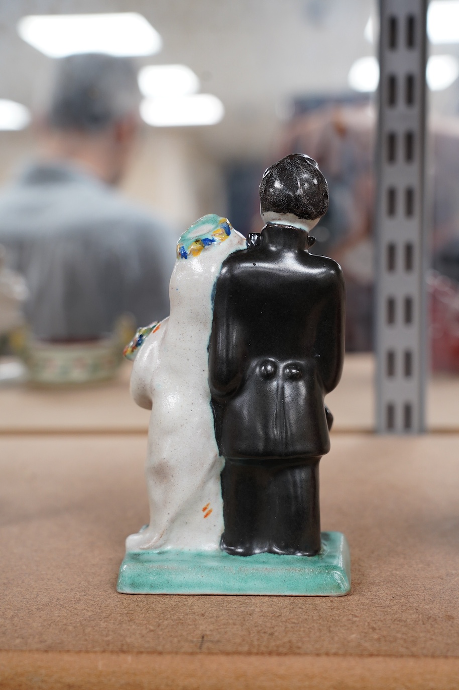 A Goldscheider stylised bride and groom, impressed 6239, 64 65, monogram H? 15.5cm high. Condition - good